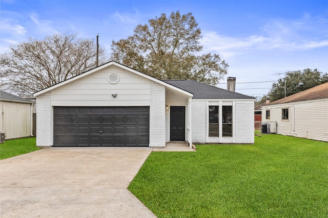 view of front of home with central AC unit and a front lawn