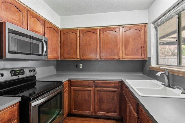 kitchen featuring sink and appliances with stainless steel finishes