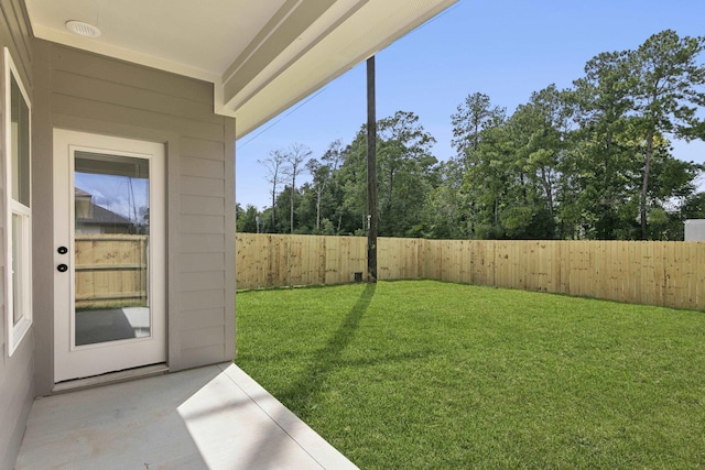 9896 Golden Ln, Lumberton, TX 77657 - fenced backyard with a patio