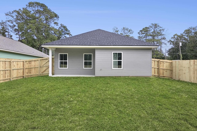 9896 Golden Ln, Lumberton, TX 77657 - rear view of house with a shingled roof, a fenced backyard, and a patio area