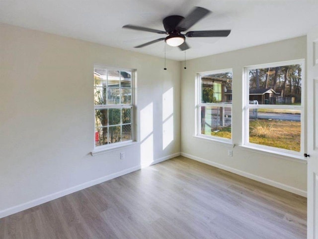 5260 Landry Ln, Beaumont, TX 77708 - empty room featuring wood finished floors and a ceiling fan