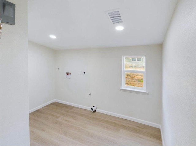 5260 Landry Ln, Beaumont, TX 77708 - laundry area with wood finished floors, washer hookup, and recessed lighting