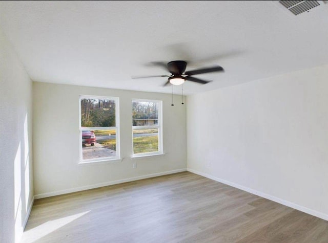5260 Landry Ln, Beaumont, TX 77708 - spare room with wood finished floors and ceiling fan