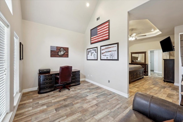 2801 Magnolia Ln, Groves, TX 77619 - office space with light wood-style floors, high vaulted ceiling, a ceiling fan, baseboards, and recessed lighting
