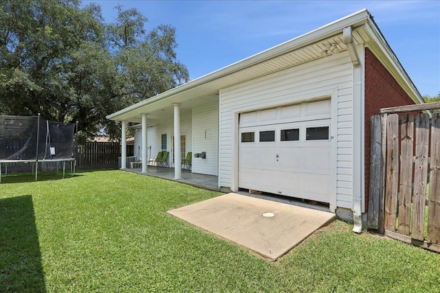 2801 Magnolia Ln, Groves, TX 77619 - view of front of home with a trampoline