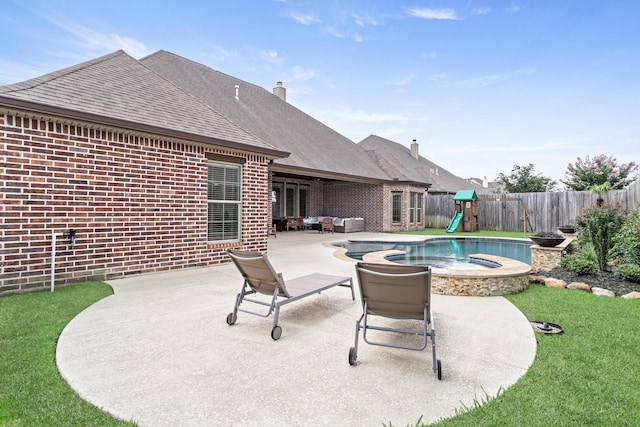 6526 Brayfield Ln, Beaumont, TX 77706 - view of swimming pool with a playground, outdoor lounge area, a fenced backyard, and a patio