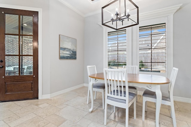 6526 Brayfield Ln, Beaumont, TX 77706 - dining room with a chandelier, healthy amount of natural light, stone tile floors, and crown molding