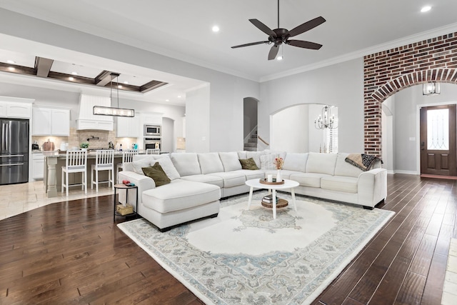 6526 Brayfield Ln, Beaumont, TX 77706 - living room featuring arched walkways, ornamental molding, hardwood / wood-style flooring, a ceiling fan, and recessed lighting