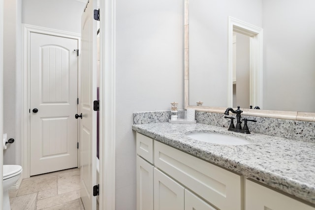 6526 Brayfield Ln, Beaumont, TX 77706 - bathroom featuring vanity and stone tile floors