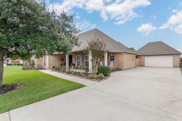 view of front of house featuring a front yard and a garage