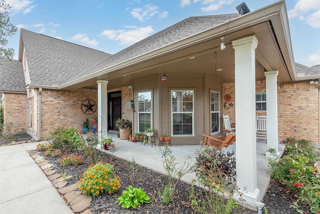 property entrance with covered porch