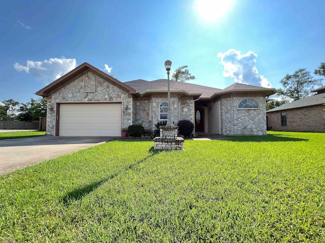 view of front facade featuring a garage, a front lawn, concrete driveway, and roof with shingles