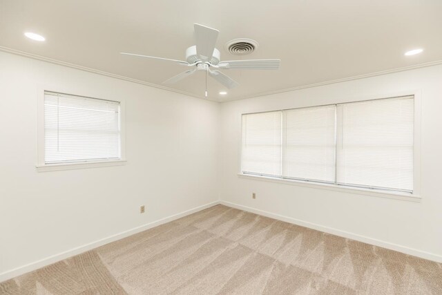 515 Watts Rd, Silsbee, TX 77656 - empty room featuring light carpet, ceiling fan, recessed lighting, and crown molding