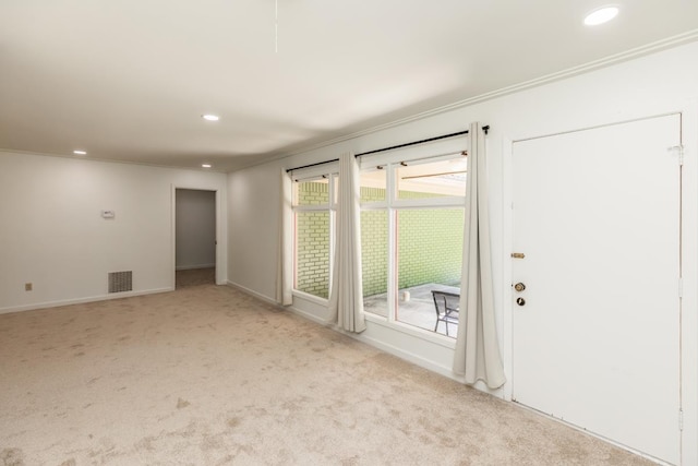 515 Watts Rd, Silsbee, TX 77656 - carpeted empty room featuring crown molding and recessed lighting