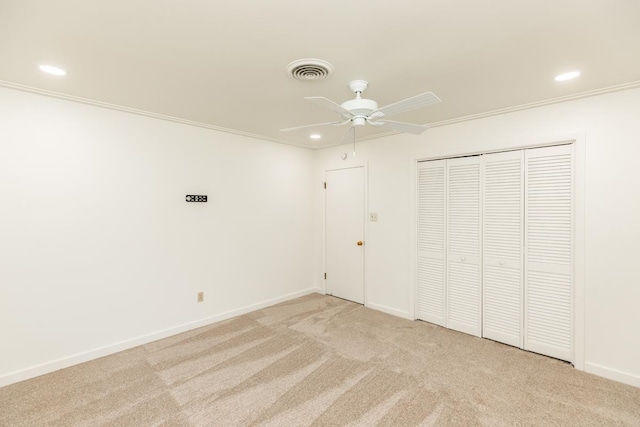 515 Watts Rd, Silsbee, TX 77656 - unfurnished bedroom with recessed lighting, light carpet, ornamental molding, a closet, and ceiling fan