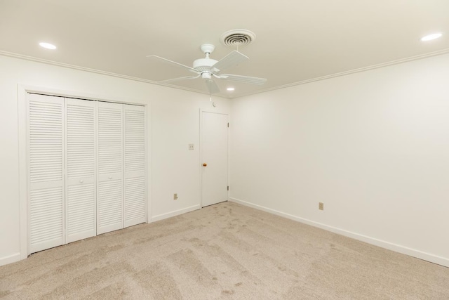 515 Watts Rd, Silsbee, TX 77656 - unfurnished bedroom featuring carpet flooring, recessed lighting, ornamental molding, a ceiling fan, and a closet