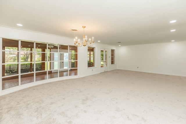515 Watts Rd, Silsbee, TX 77656 - carpeted empty room featuring a chandelier, recessed lighting, and crown molding