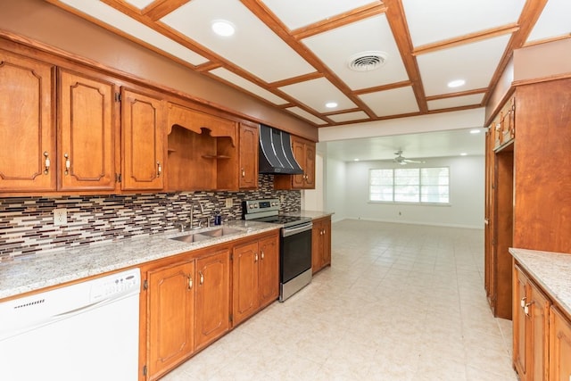 515 Watts Rd, Silsbee, TX 77656 - kitchen with stainless steel range with electric stovetop, dishwasher, custom exhaust hood, backsplash, and brown cabinetry