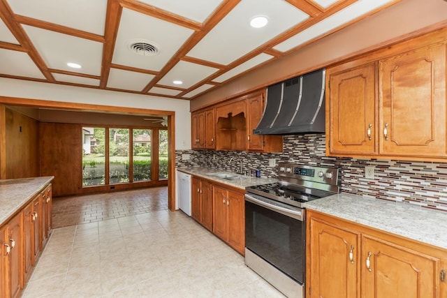 515 Watts Rd, Silsbee, TX 77656 - kitchen with stainless steel electric range, exhaust hood, white dishwasher, decorative backsplash, and brown cabinetry