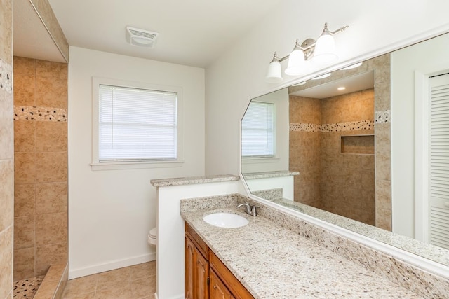 515 Watts Rd, Silsbee, TX 77656 - bathroom with vanity, walk in shower, and tile patterned floors
