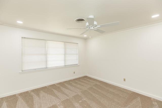 515 Watts Rd, Silsbee, TX 77656 - unfurnished room featuring light colored carpet, recessed lighting, ceiling fan, and ornamental molding
