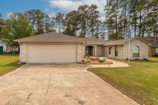 ranch-style home featuring a garage and a front lawn