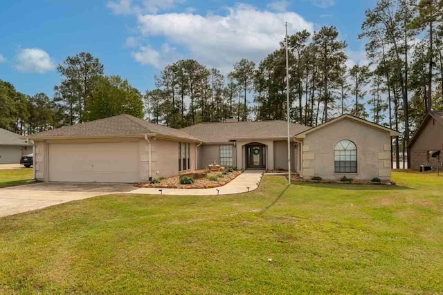 single story home featuring a front lawn and a garage