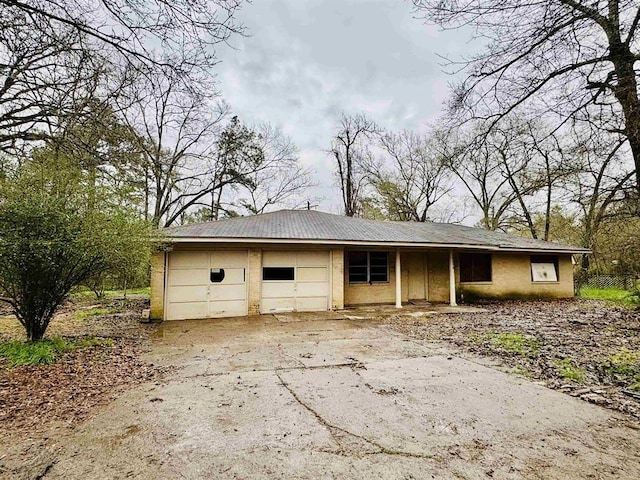 10570 Martha Ln, Beaumont, TX 77713 - garage with concrete driveway
