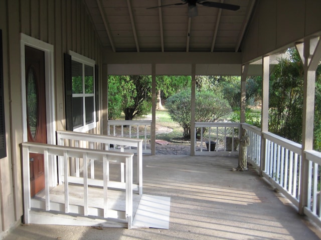 wooden deck with ceiling fan and covered porch