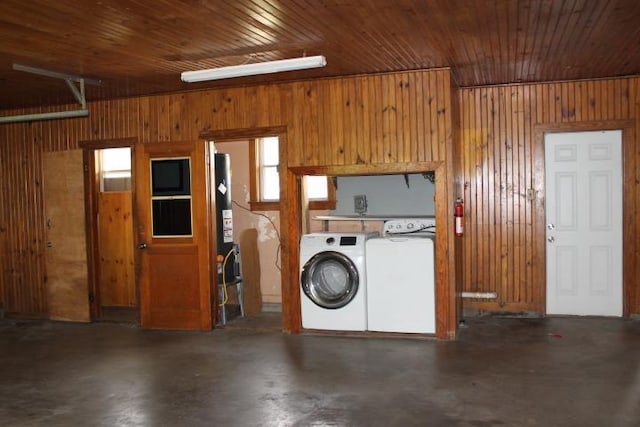 4246 Griffing Dr, Port Arthur, TX 77642 - washroom with wooden walls, washing machine and clothes dryer, and wood ceiling