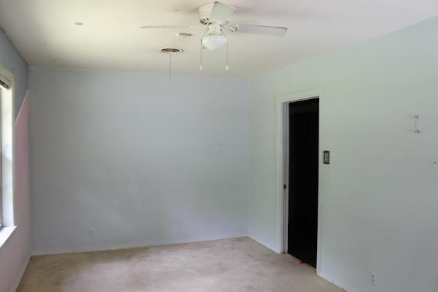 4246 Griffing Dr, Port Arthur, TX 77642 - empty room with a ceiling fan and light carpet