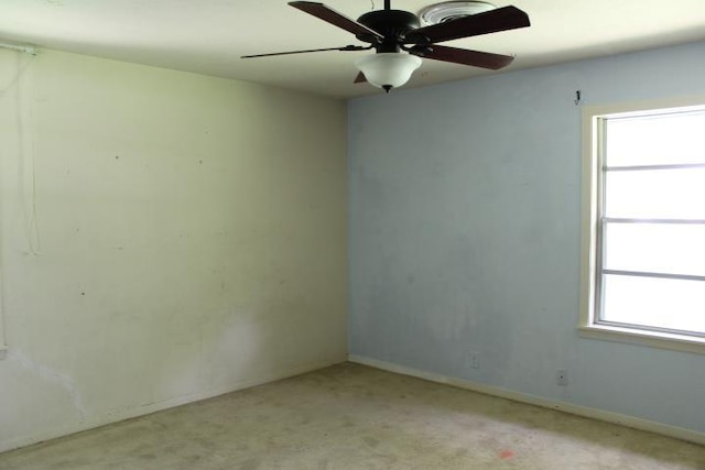 4246 Griffing Dr, Port Arthur, TX 77642 - spare room with ceiling fan, light carpet, and baseboards