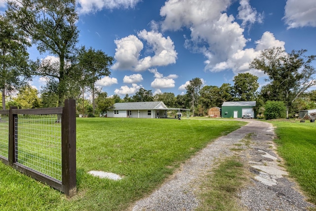 view of yard with an outdoor structure