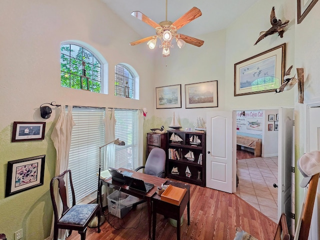 404 Pintail Ln, Orange, TX 77630 - office space with high vaulted ceiling, a ceiling fan, and wood finished floors