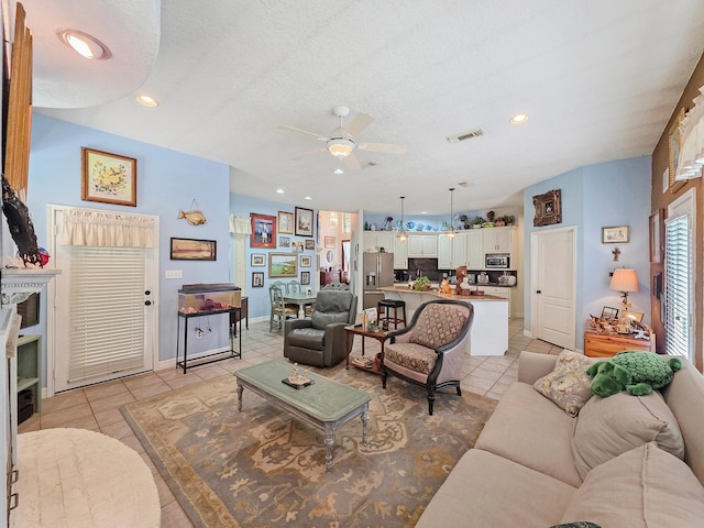 404 Pintail Ln, Orange, TX 77630 - living area with a ceiling fan, light tile patterned flooring, recessed lighting, and baseboards