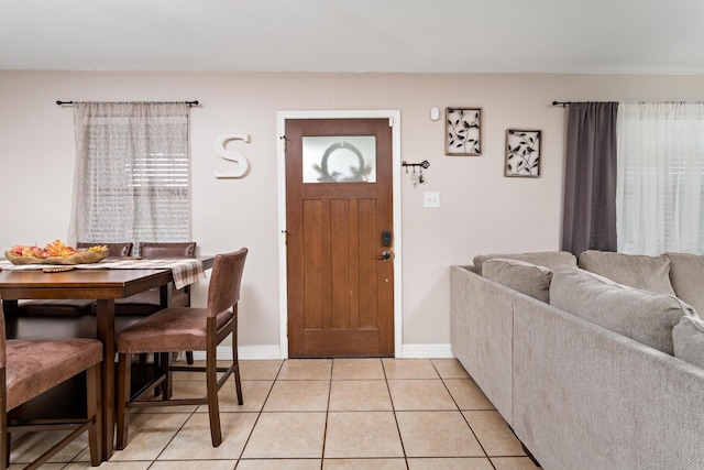 entryway featuring light tile patterned floors