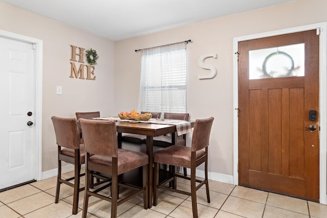 view of tiled dining space