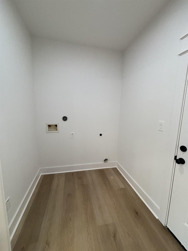 laundry area with electric dryer hookup, hookup for a washing machine, and hardwood / wood-style floors