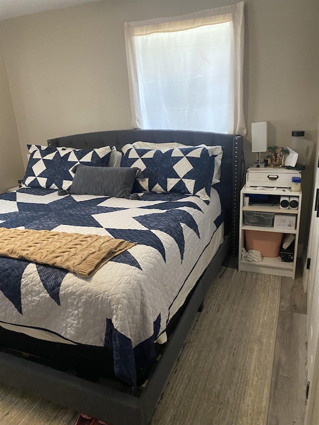 6033 Stones Throw Dr, Silsbee, TX 77656 - bedroom featuring wood finished floors