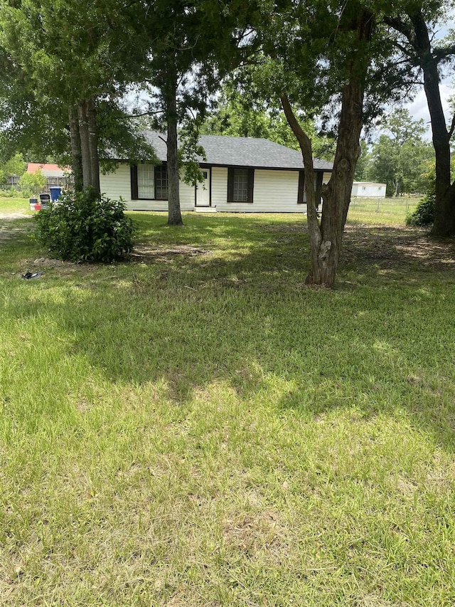6033 Stones Throw Dr, Silsbee, TX 77656 - view of grassy yard
