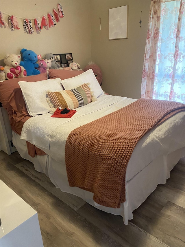 6033 Stones Throw Dr, Silsbee, TX 77656 - bedroom featuring wood finished floors