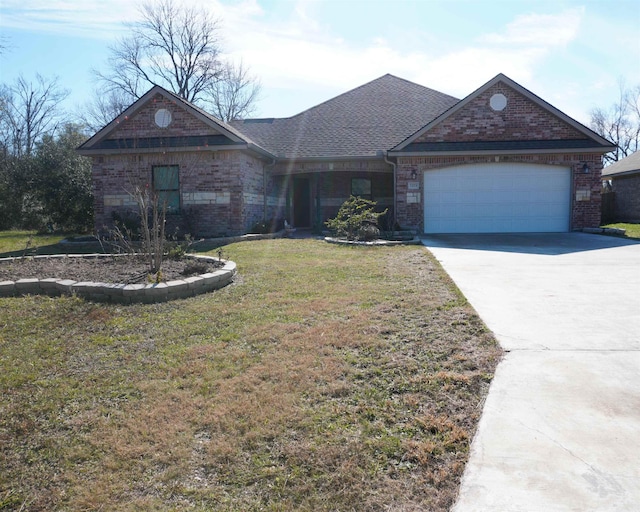 single story home featuring a front yard and a garage