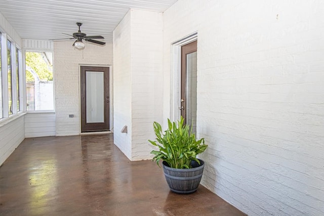 exterior space featuring ceiling fan