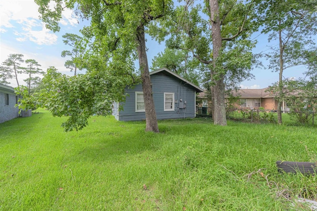 view of yard featuring central AC