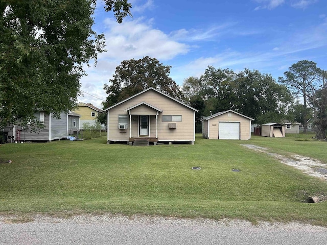 view of front facade featuring cooling unit, a storage unit, a front lawn, and a garage