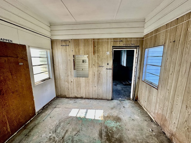 312 Temple, Woodville, TX 75979 - spare room featuring wooden walls