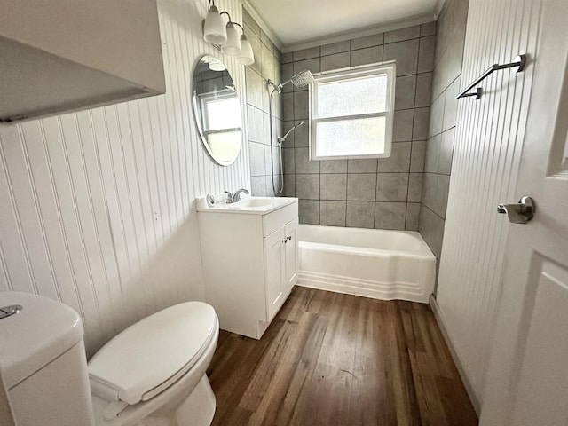 312 Temple, Woodville, TX 75979 - full bath featuring wood finished floors, vanity, and shower / bathtub combination