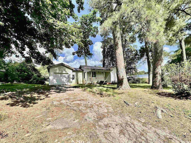 312 Temple, Woodville, TX 75979 - single story home with a garage