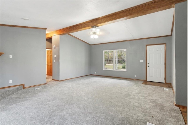 unfurnished living room featuring light carpet, beam ceiling, ceiling fan, and ornamental molding