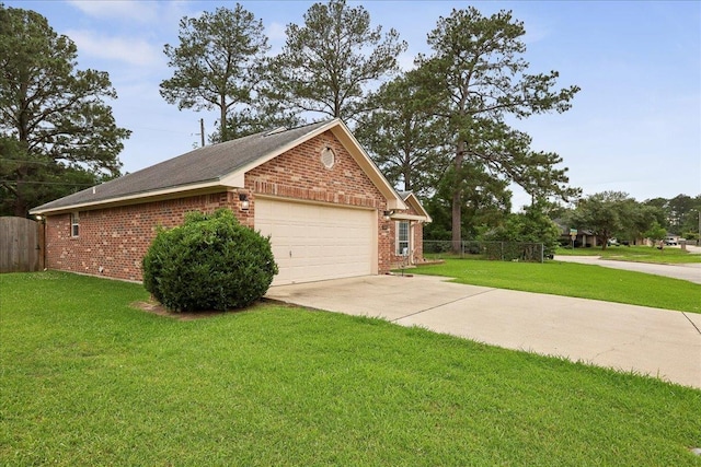 7385 Hidden Valley Dr, Beaumont, TX 77706 - view of side of property with brick siding, driveway, and a garage